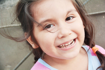 Charming latin little girl smiling