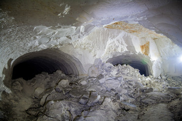 The collapse in the chalk mine, tunnel with traces of drilling machine