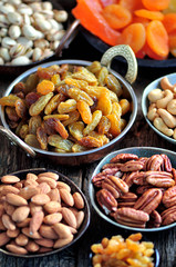 Healthy food - raisins, dried cranberries, kiwi, apricots, papaya, pistachios, cashews, almonds and more.