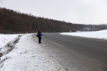 Winter road. Trip. Winter hitch-hiking. Travel