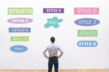 designer choosing style, fonts, shapes and colors  for design