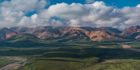 Panorama of Mountains, Sky and Green Plains in Alaska