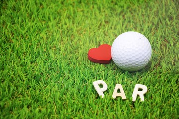 Golf ball are on green grass