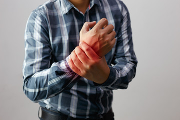 man suffering from elbow joint pain,people, healthcare and problem concept