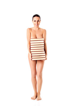 Beautiful topless woman with a books.