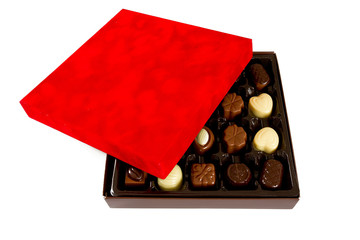 assorted chocolates in a box isolated on white