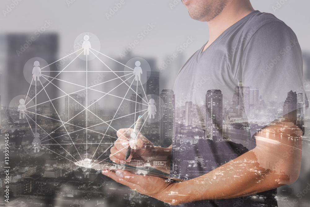 Aufkleber double exposure of success businessman using digital tablet with social media network diagram,intern