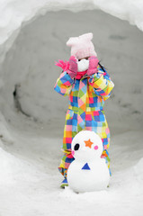 a girl and snow man in japan
