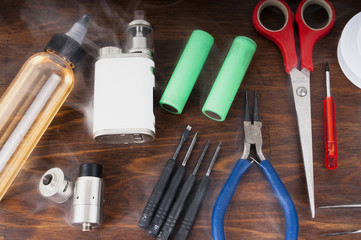 Set to vape. Tools, candy, liquid, RDA, RTA.