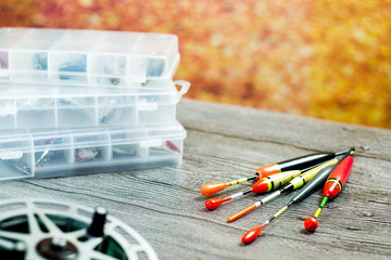 Fishing floats with acsessories on the wooden table © mikhaff1984