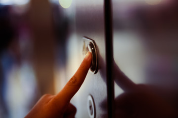 Pressing elevator button