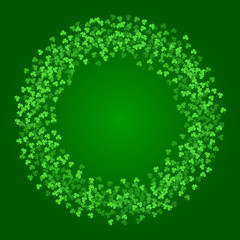 Square Saint Patricks Day background with green clover confetti. Wreath of shamrock leaves. Torus shape frame. Template for greeting card design, banner, flyer, party invitation.