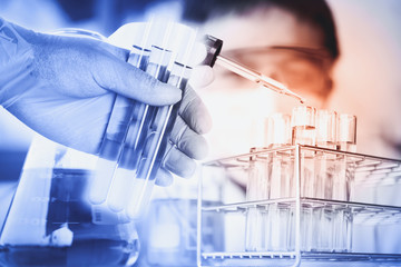 scientist with equipment and science experiments ,Laboratory glassware containing chemical liquid,...