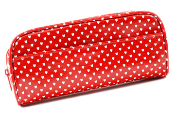 red cosmetic bag with white hearts