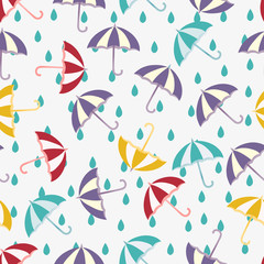 Fototapeta na wymiar Seamless vector pattern with red, yellow, purple umbrellas and blue drops. Cute spring background. Cartoon weather illustration.