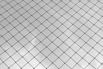 square net against the sky - black and white