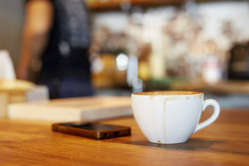 Coffee cup on wooden table