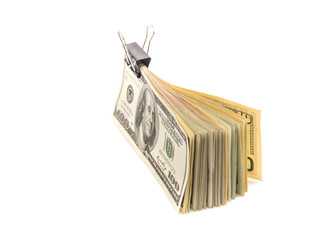 Pile of one hundred dollar bills isolated on white background