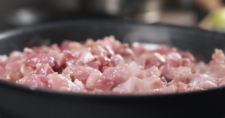 pork meat frying on pan cooking pilaf, 4k photo