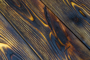 Burned wood board texture background