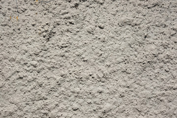 Rough gray concrete wall background, texture
