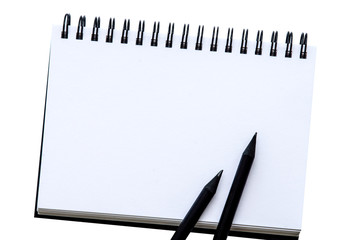 paper notebook and pencil
