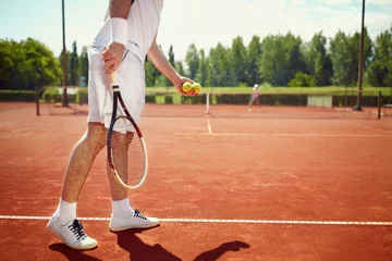 Fototapeten Serving tennis ball © luckybusiness