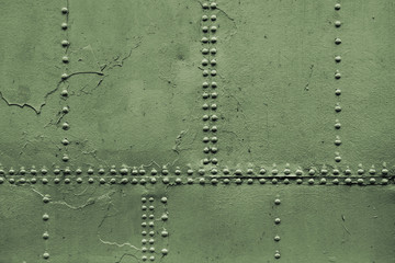 Old military green metal sheets with rivet
