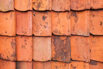 Vintage red roof tiling, close-up texture