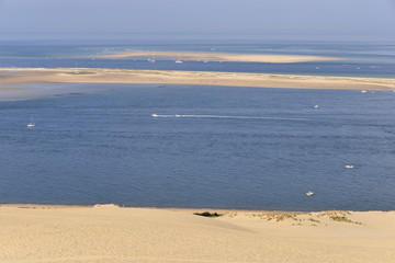 Fototapeta na wymiar Banc of Arguin seen from famous Dune of Pilat located in La Teste-de-Buch in the Arcachon Bay area, in the Gironde department in southwestern France