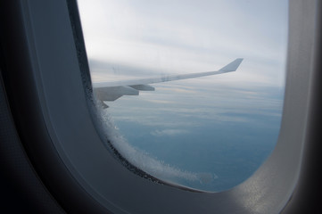 Fototapeta na wymiar view flying plane window