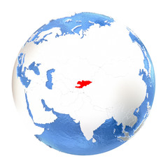 Kyrgyzstan on globe isolated on white