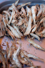 Fried fish at a street food market 