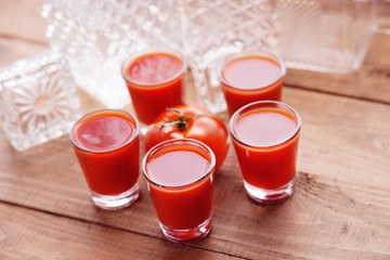 Cold Bloody Mary cocktail shot in glasses