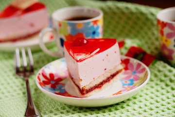 Piece of cake, metal fork and cup of coffee 