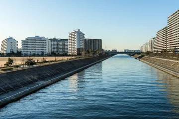Foto op Canvas 千葉県浦安市　境川と高層住宅１ © onotorono