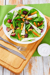 grape, blue cheese, spinach, dried apricots salad