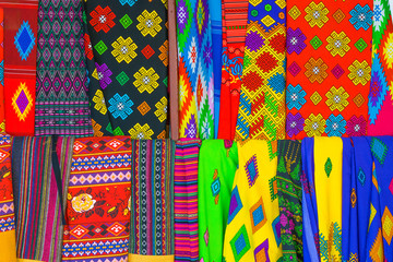Colorful fabric pattern for background and design display at fabric shop.