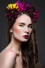 Beautiful girl with flowers on head