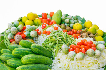 Vegetable for papaya spicy salad or Somtum,  Thai food. lemon, tomatoes, sliced green papaya, eggplant, cucumber  on white background.