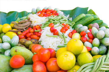Vegetable for papaya spicy salad or Somtum,  Thai food. lemon, tomatoes, sliced green papaya, eggplant, cucumber  on white background.