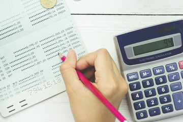 Accountant verify the Saving Account Book and Statement of financial statements / Bookkeeping /...