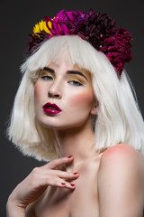 Beautiful girl with floral head accessory