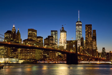 Obrazy na Plexi  Most Brookliński i panoramę Nowego Jorku na Manhattanie o zmierzchu