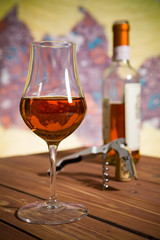 Closeup of a glass of Italian vin santo wine