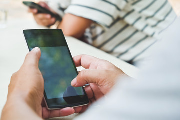 Group of people using mobile devices