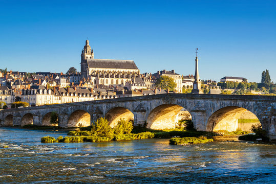 Medieval bridge over Loire river in town of Blois, France. 