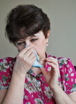 woman has a disease of the nose