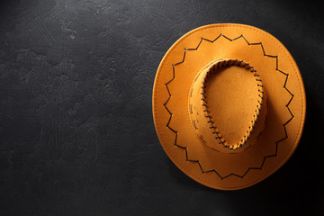 cowboy hat on black background