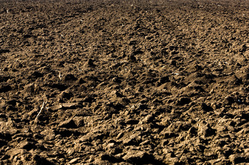 Ploughed soil in agricultural field arable land